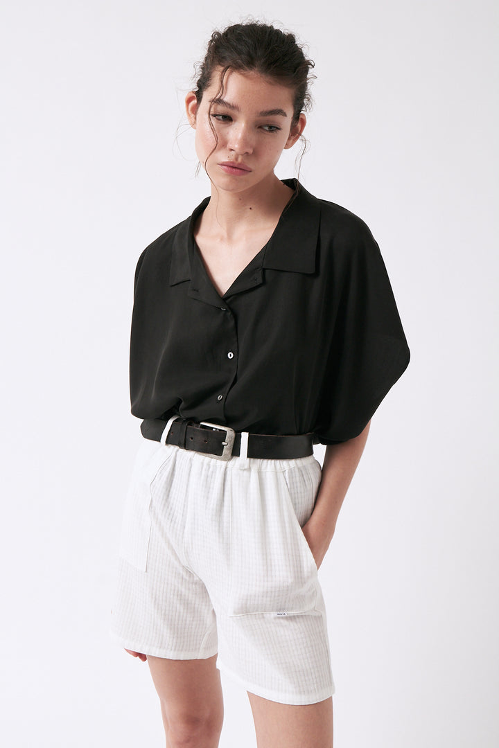 Pantalons curts Caracas